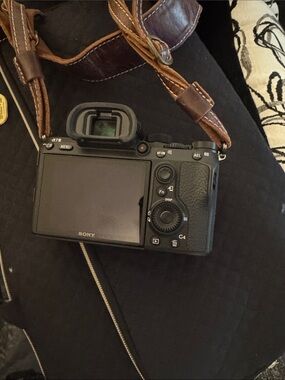 Sony A7 Series 3 Black Mirrorless Camera Body with Brown Leather Strap